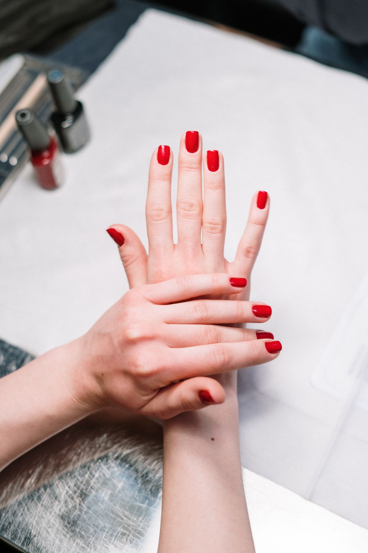 Red manicure set by Nail Therapy Beauty Boutique