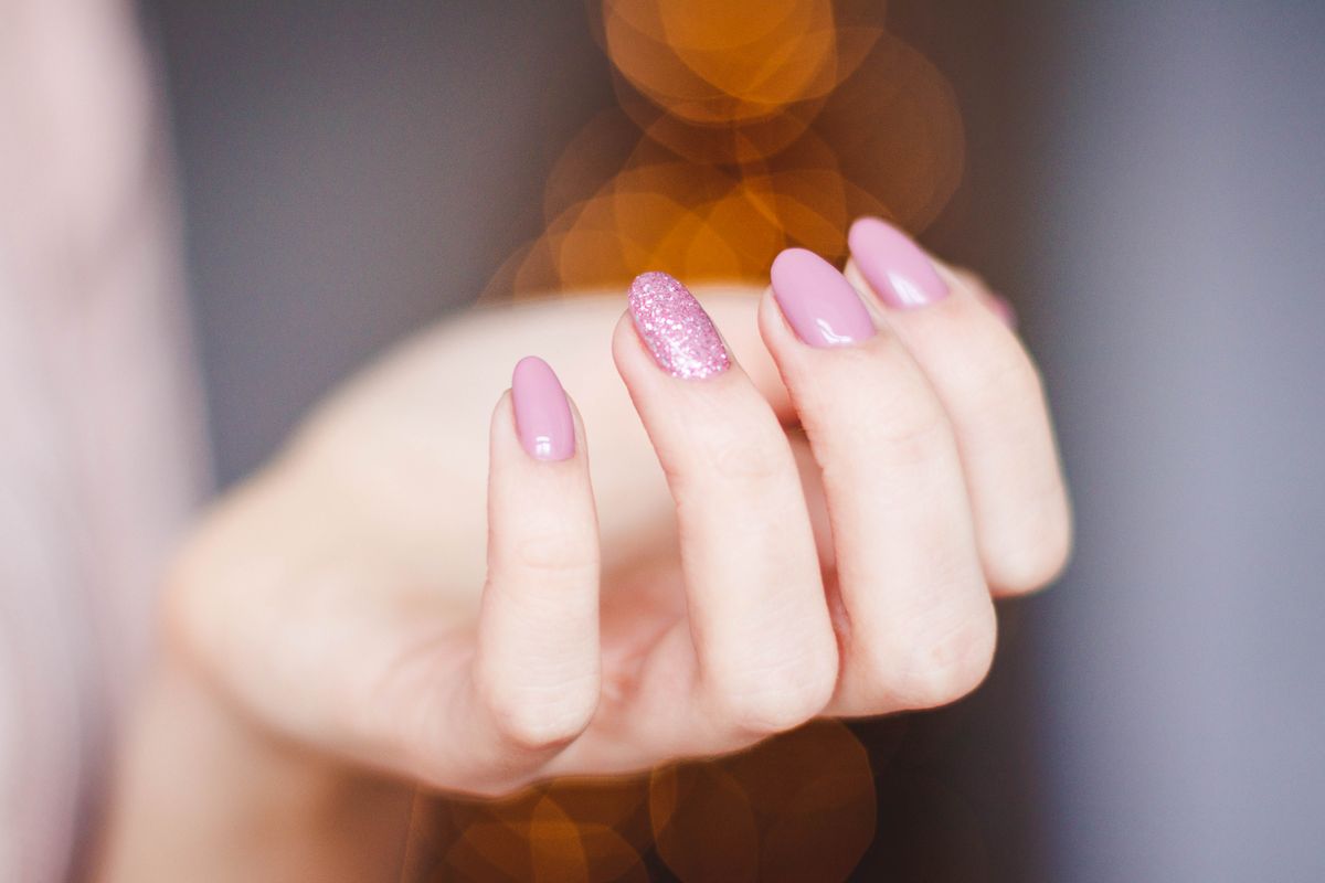 Pink glitter gel manicure by Nail Therapy Beauty Boutique
